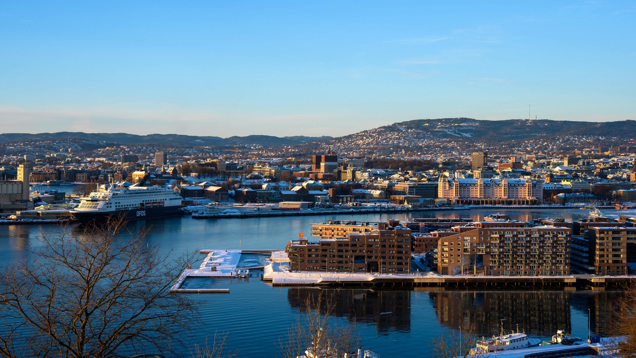 Refined Stays: A Guide to the Best eco-luxury hotels Oslo A view of refined eco-luxury hotels Oslo and the city skyline