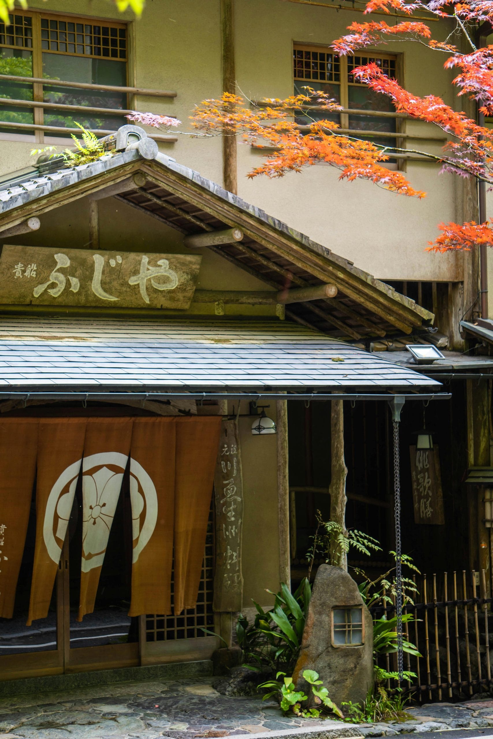Kyoto Boutique Hotels: A Guide to Refined Luxury Stays Interior of a luxury modern ryokan in Kyoto with a view of a zen garden