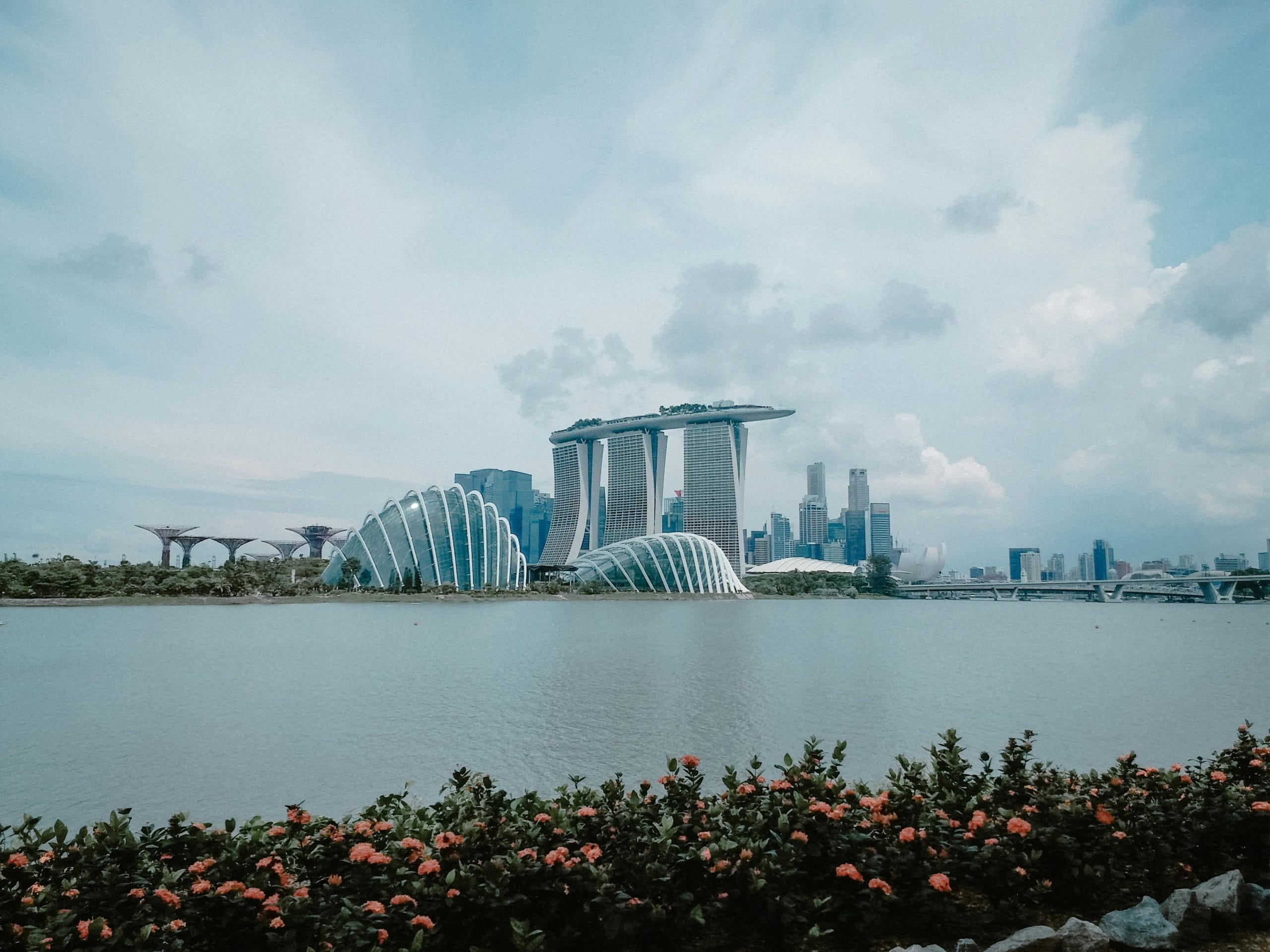 Where to Stay in Singapore: A Guide for First-Time Visitors Luxury cityscape of Singapore's Marina Bay Sands area.