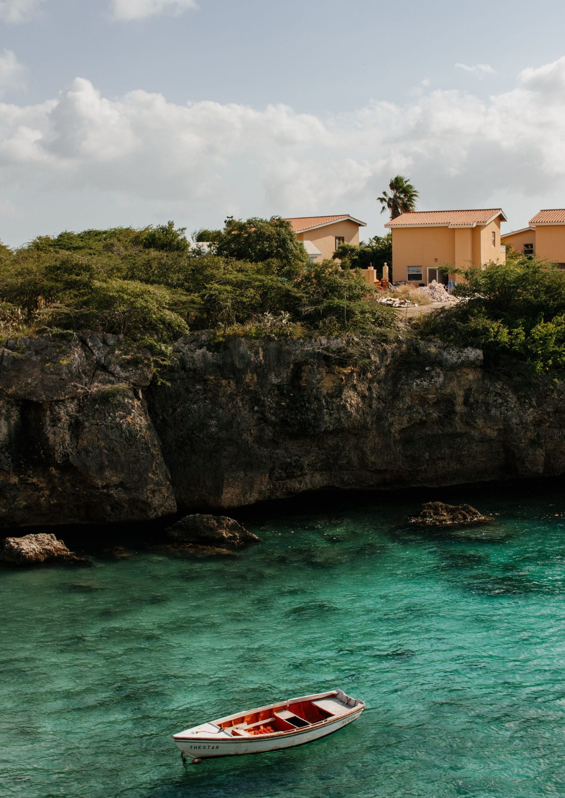 Caribbean Quiet Luxury Escapes for the Refined Traveler A serene terrace overlooking the ocean in one of the many Caribbean quiet luxury escapes