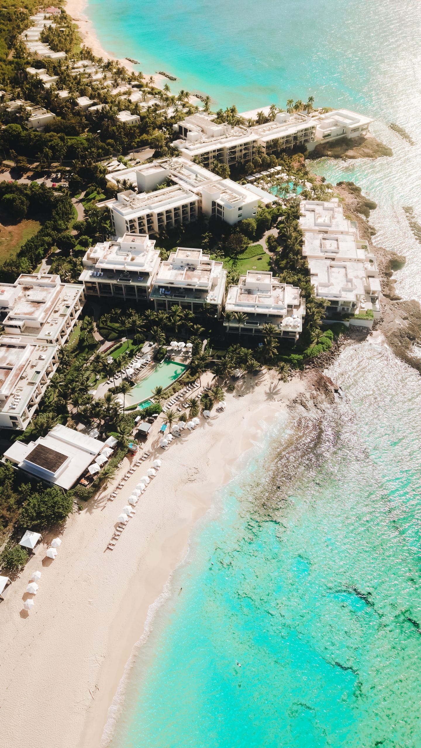 Caribbean Quiet Luxury Escapes for the Refined Traveler A serene terrace overlooking the ocean in one of the many Caribbean quiet luxury escapes