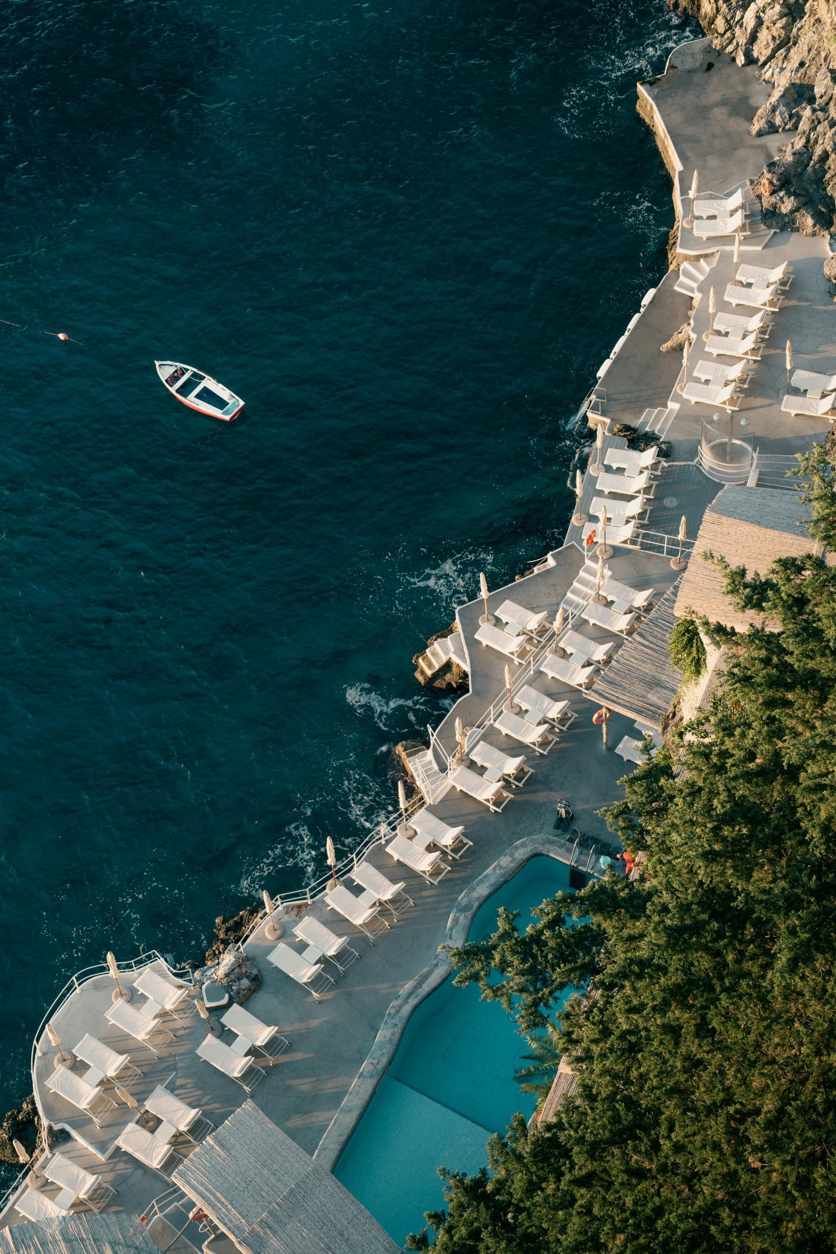A serene view of luxury boutique stays Tuscany overlooking the coast.