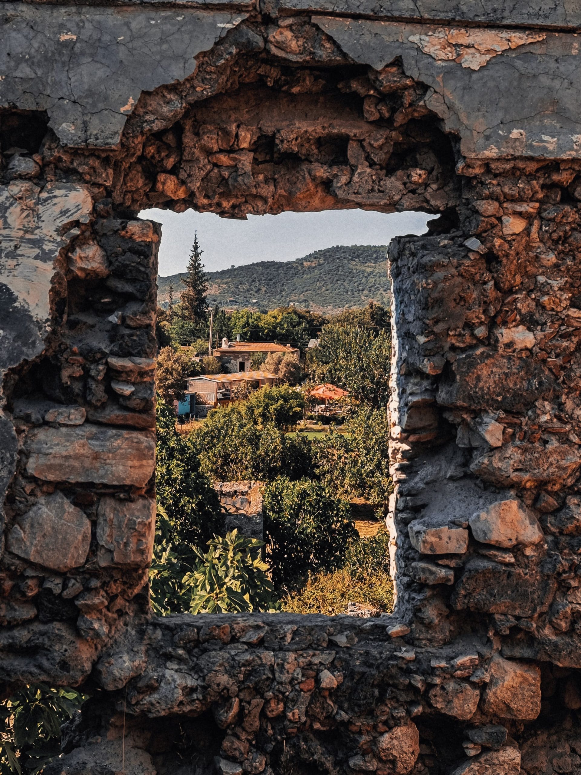 Refined luxury hotels overlooking ruins during golden hour