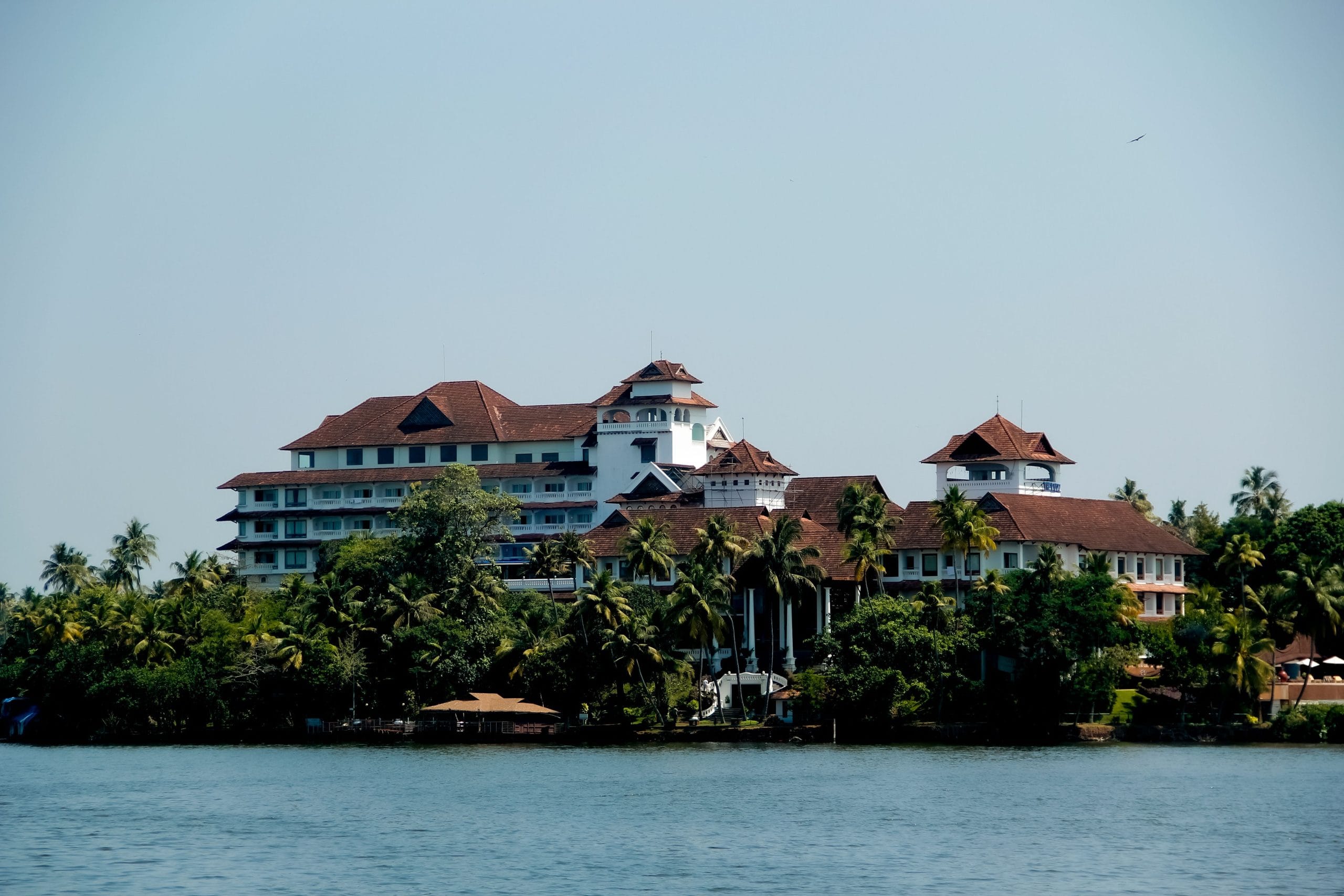 A serene luxury houseboat Kerala drifting through backwaters