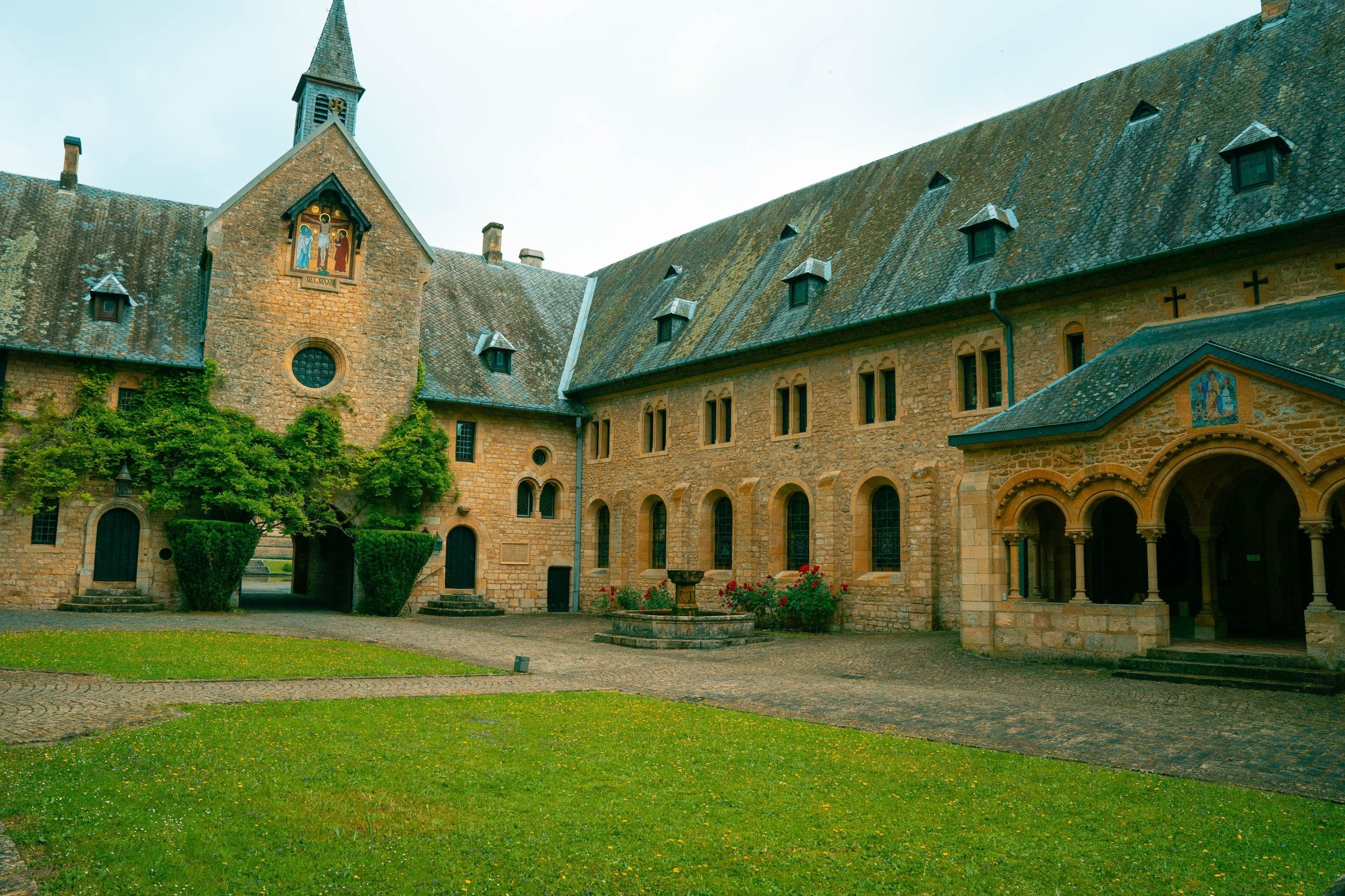 Finding Peace in Europe's Finest Luxury Monastery Hotels A serene courtyard at one of Europe's luxury monastery hotels