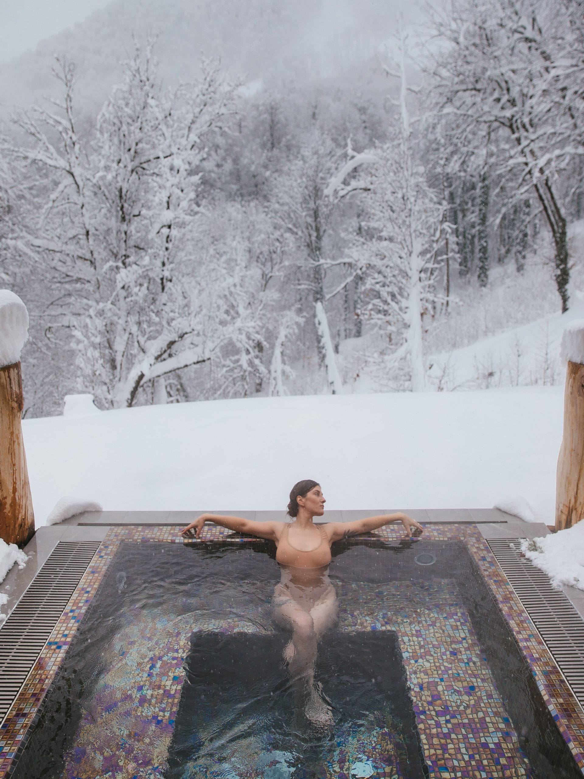A serene luxury thermal spa Europe outdoor pool at blue hour