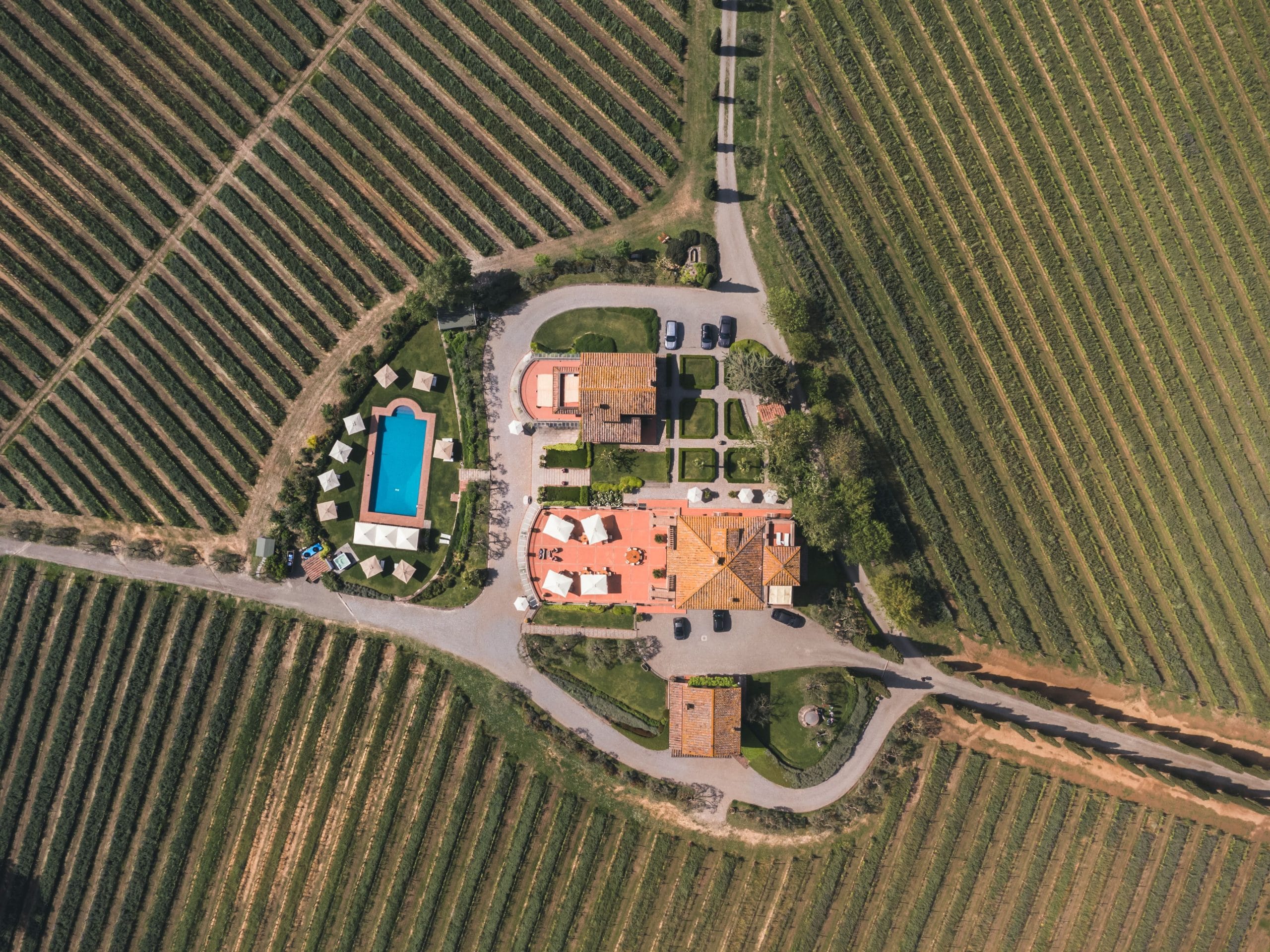A cinematic view of luxury vineyard estates Tuscany