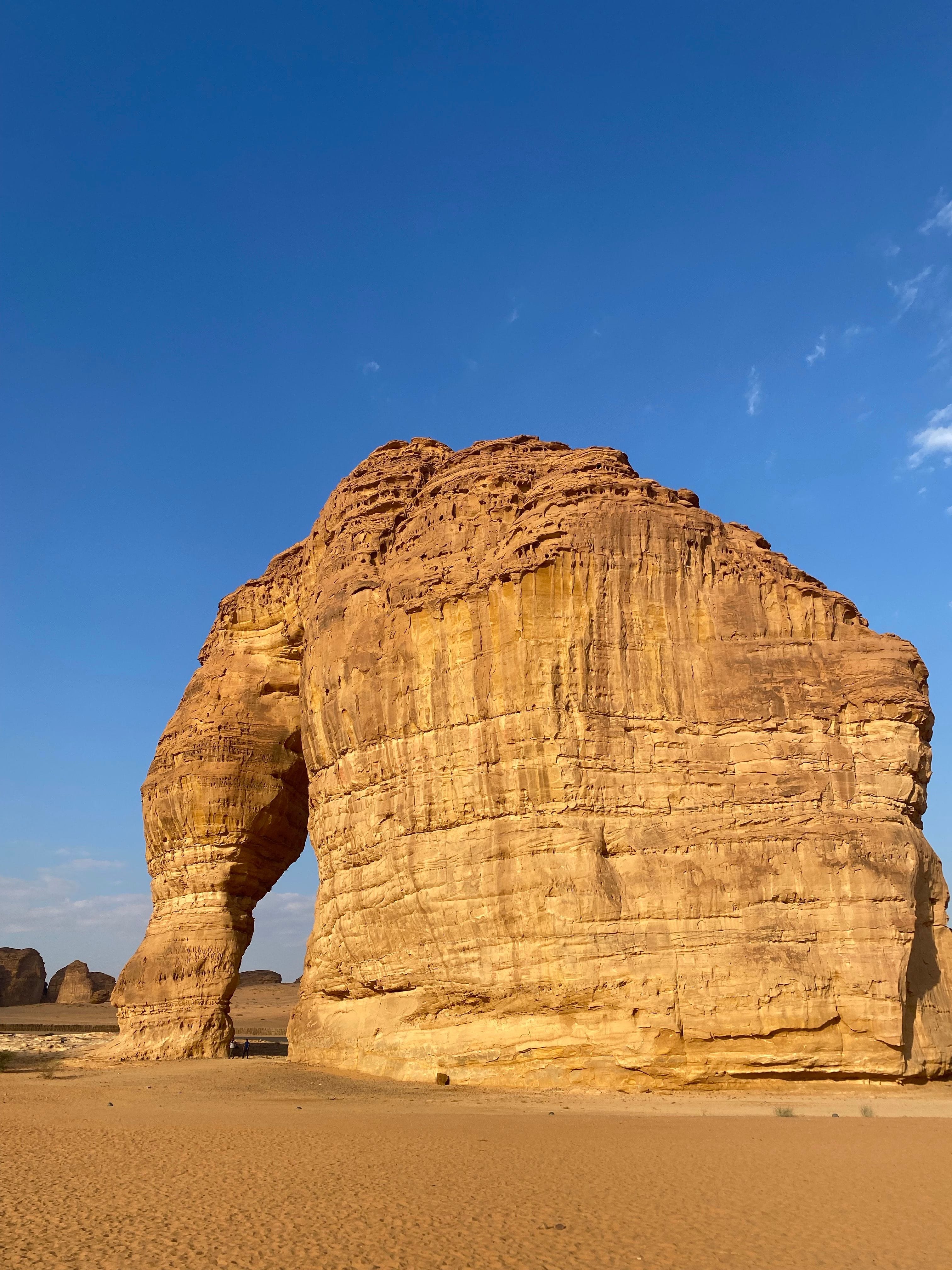 A serene view of AlUla luxury desert retreats among sandstone cliffs