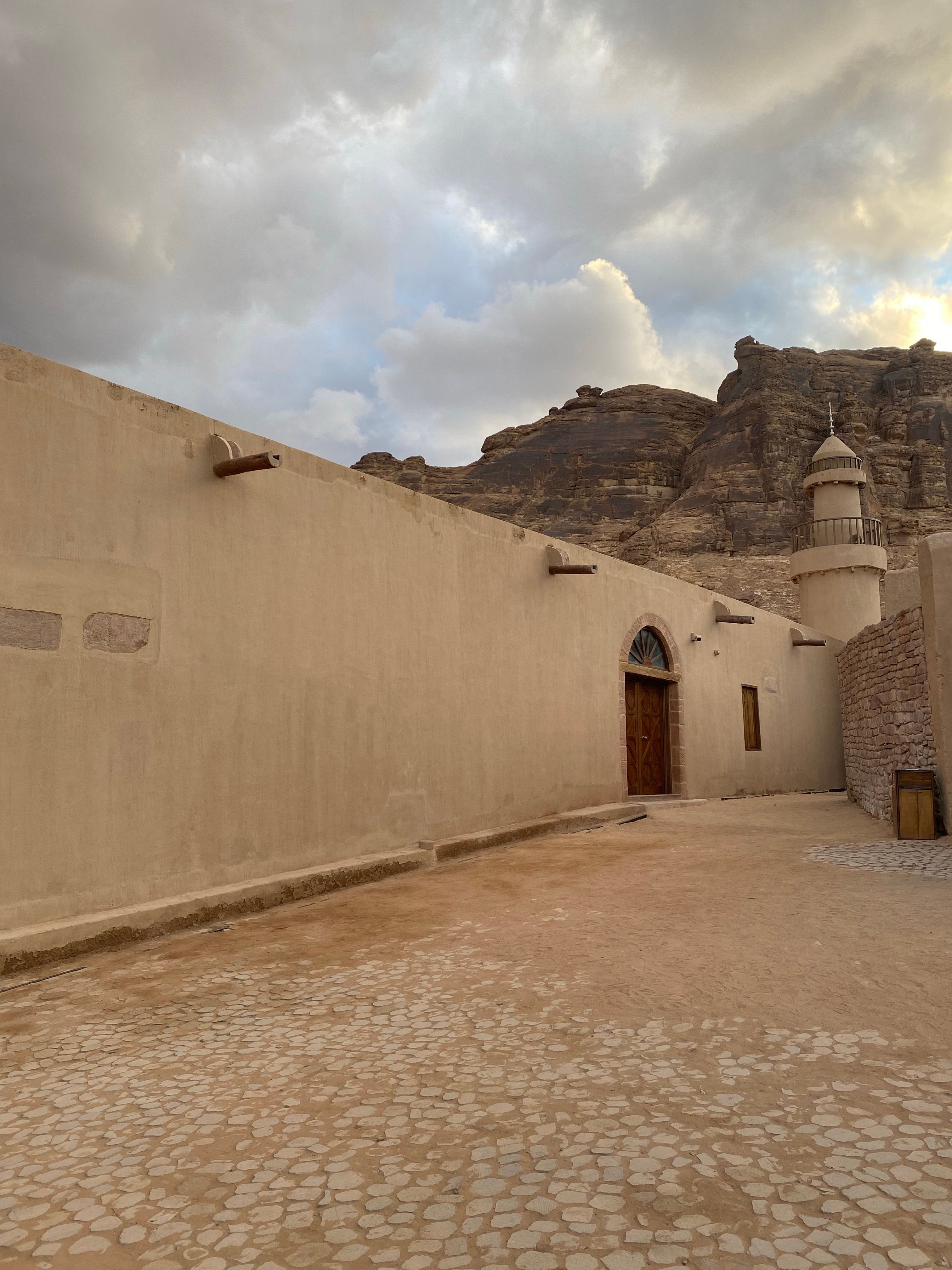 A serene view of AlUla luxury desert retreats among sandstone cliffs