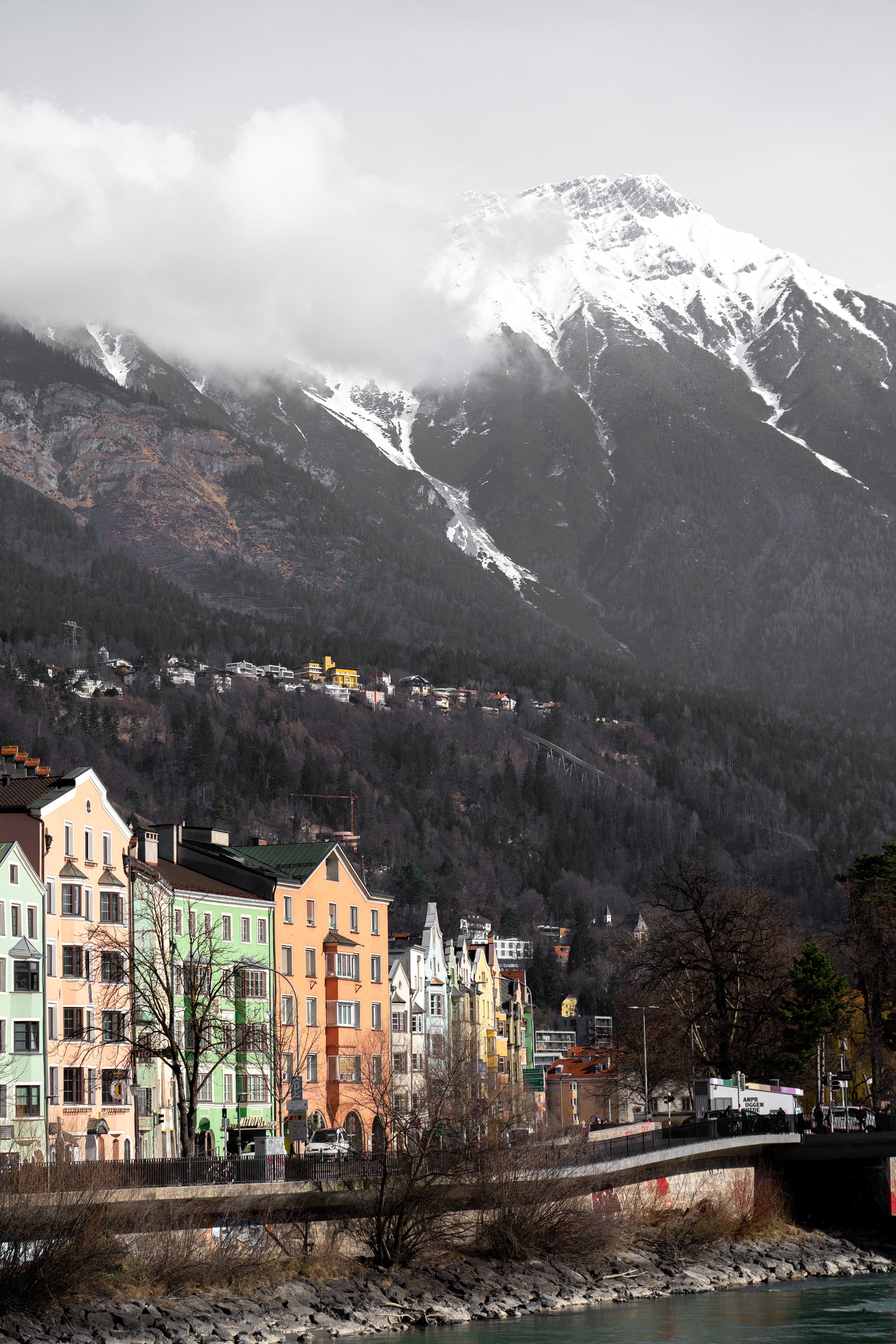 A scenic view of the city and mountains highlighting the best areas to stay in Innsbruck