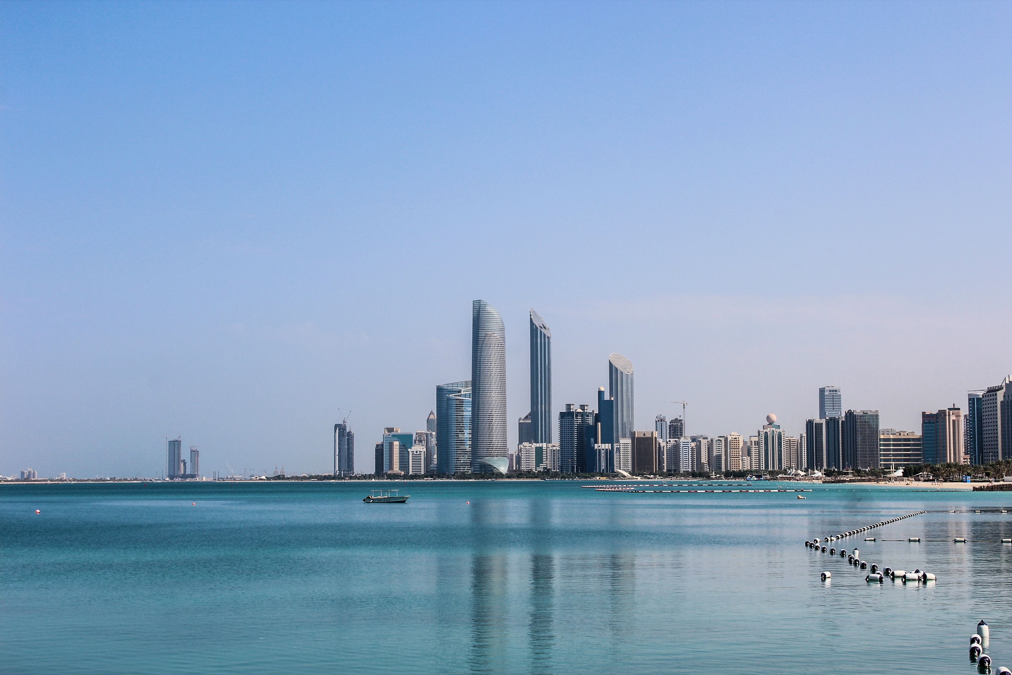 A serene view of Abu Dhabi desert luxury resorts during sunrise