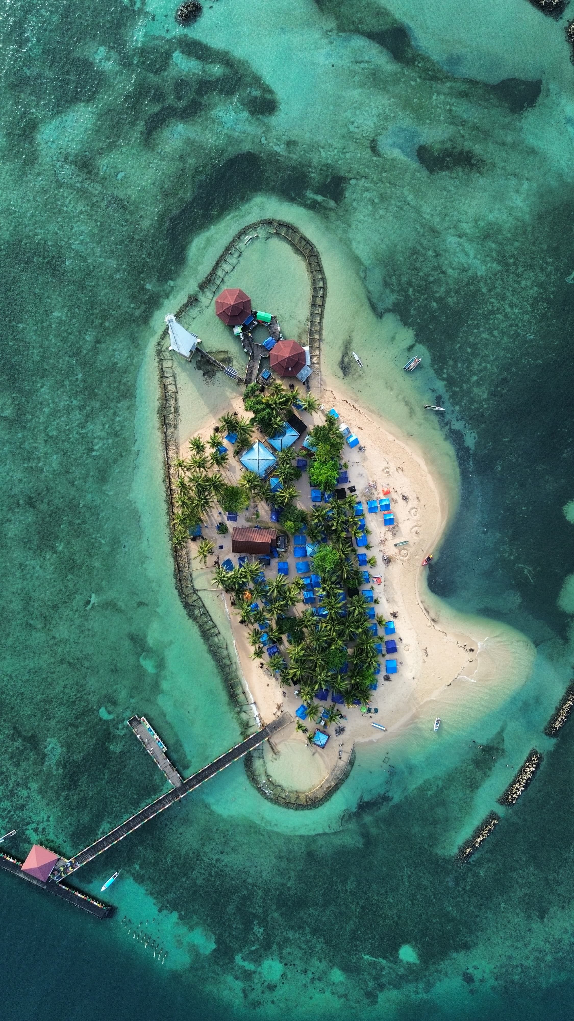 A serene view of Belize luxury coastal escapes at golden hour
