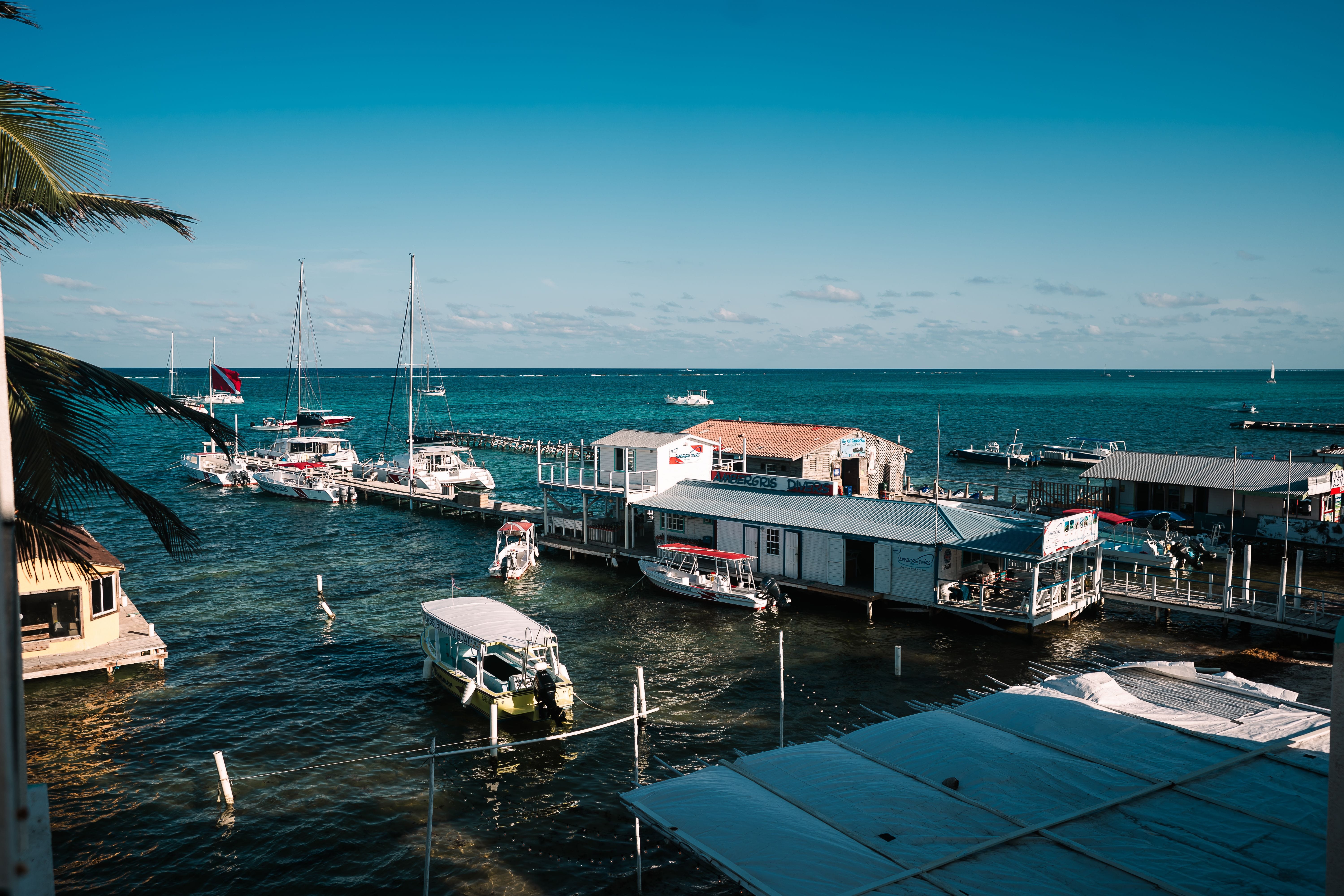A serene view of Belize luxury coastal escapes at golden hour