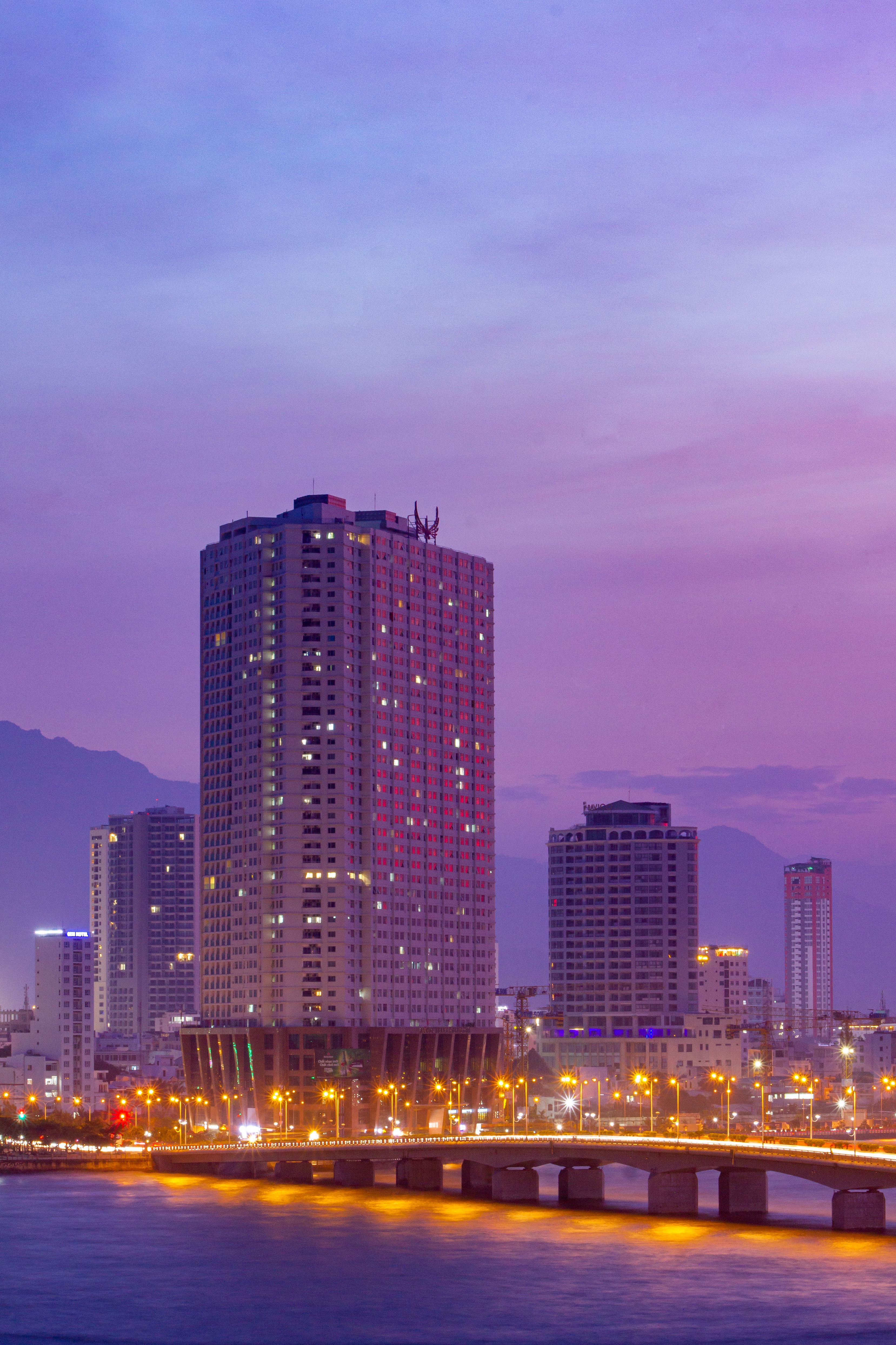 A serene Da Nang luxury coastal escape featuring a modern resort at twilight