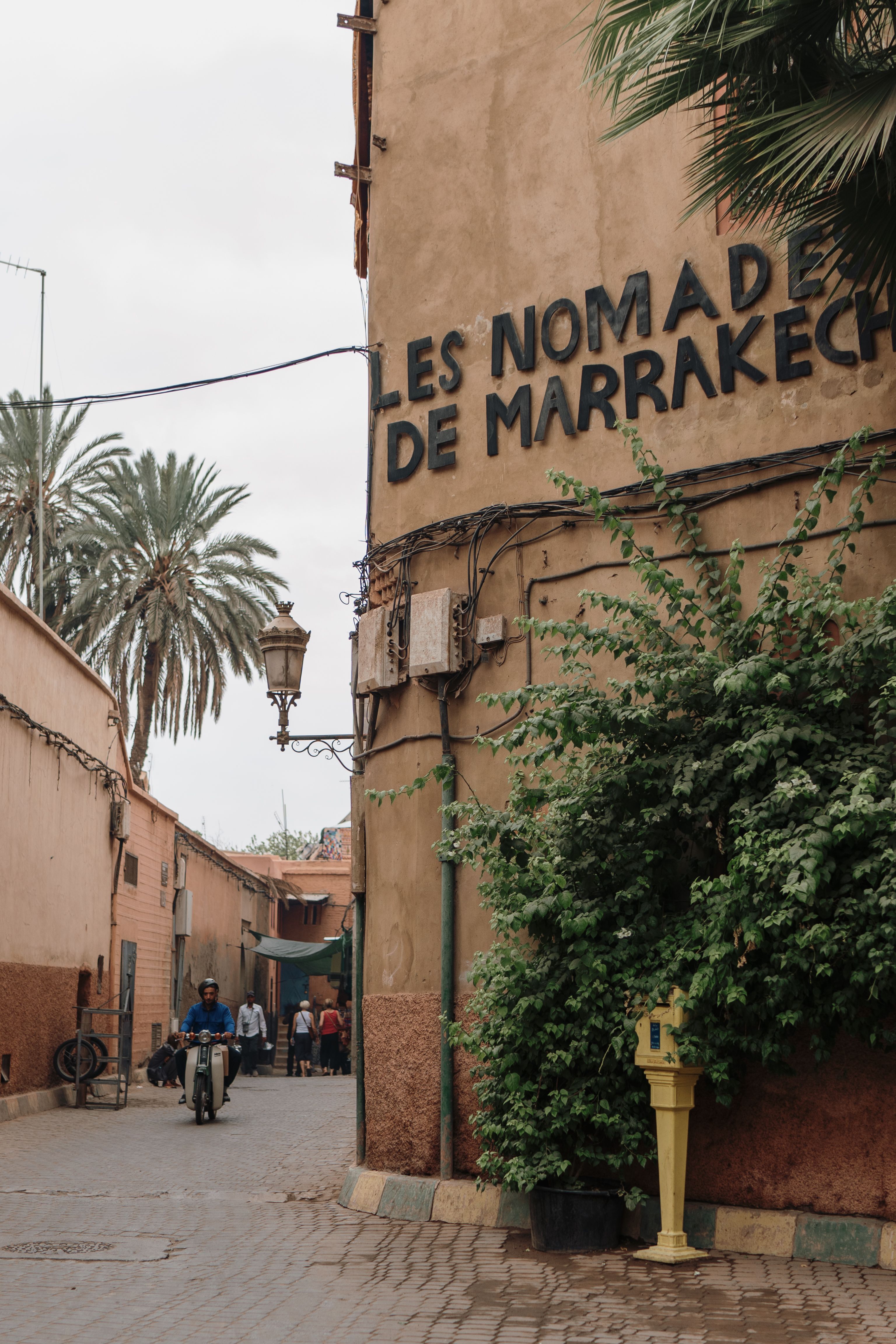 A serene courtyard showcasing Marrakesh luxury riads inspiration with neutral tones and golden hour light