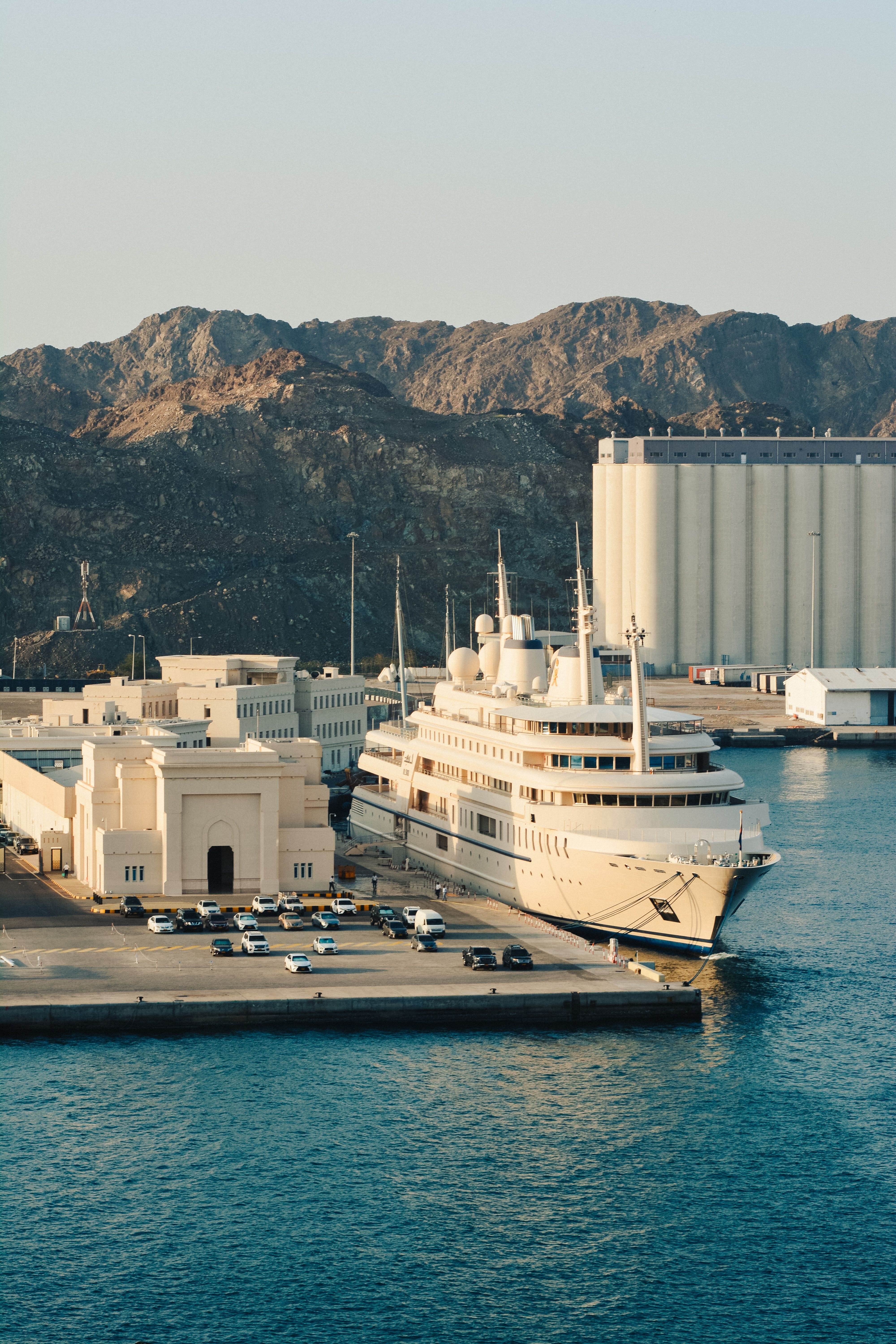A serene view of Oman luxury mountain retreats at sunset