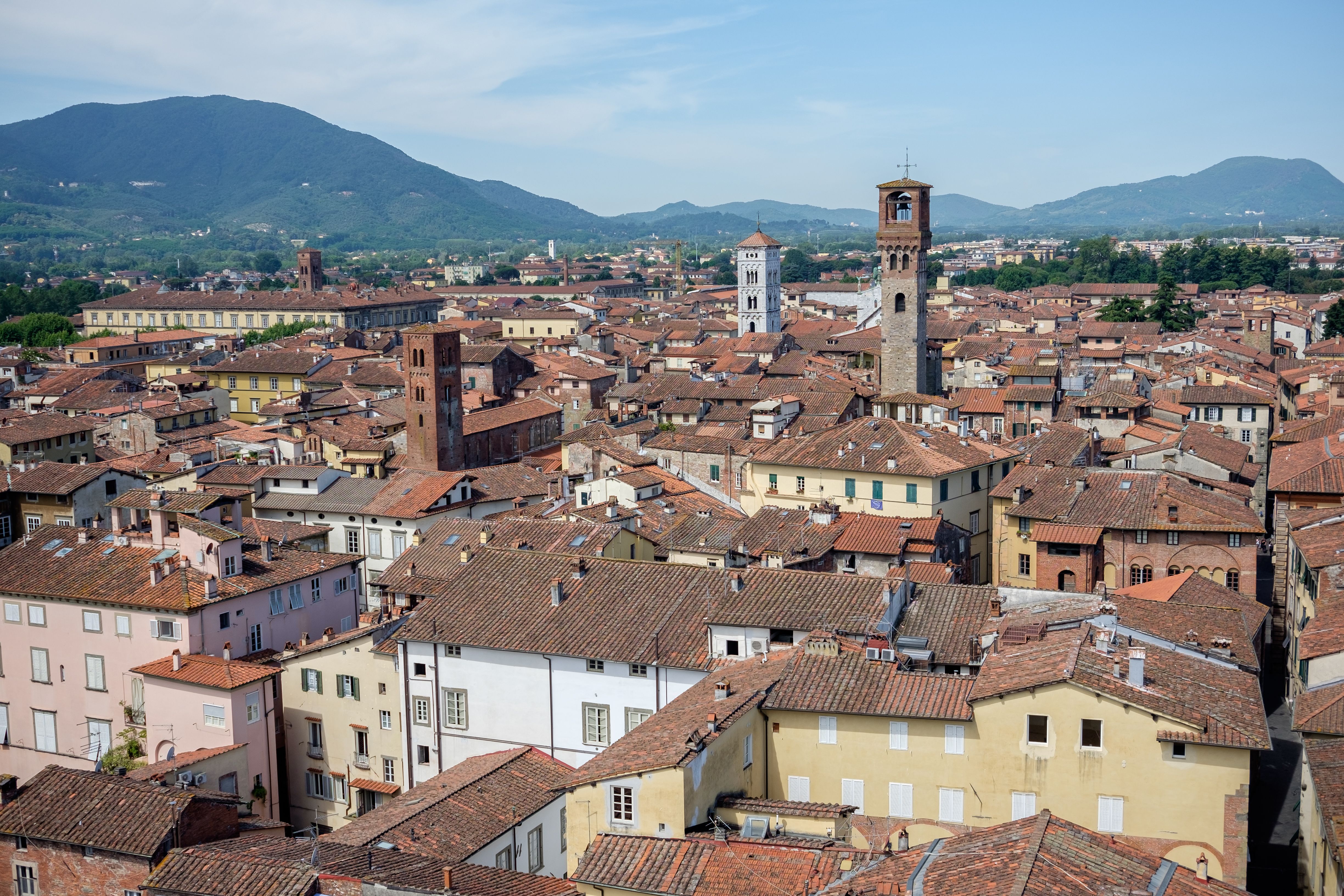 An elegant street view showcasing Lucca luxury boutique stays in Italy