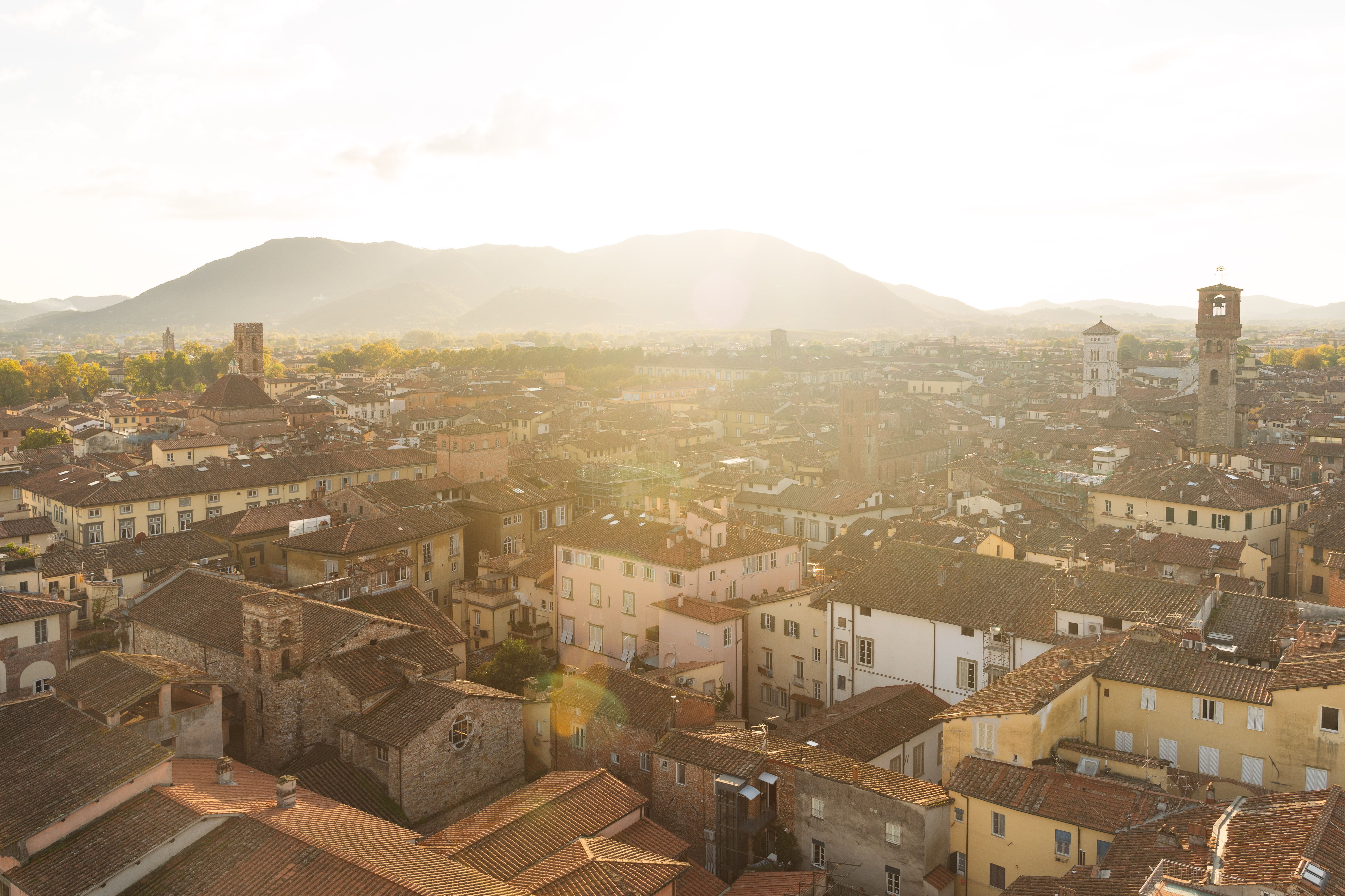 An elegant street view showcasing Lucca luxury boutique stays in Italy