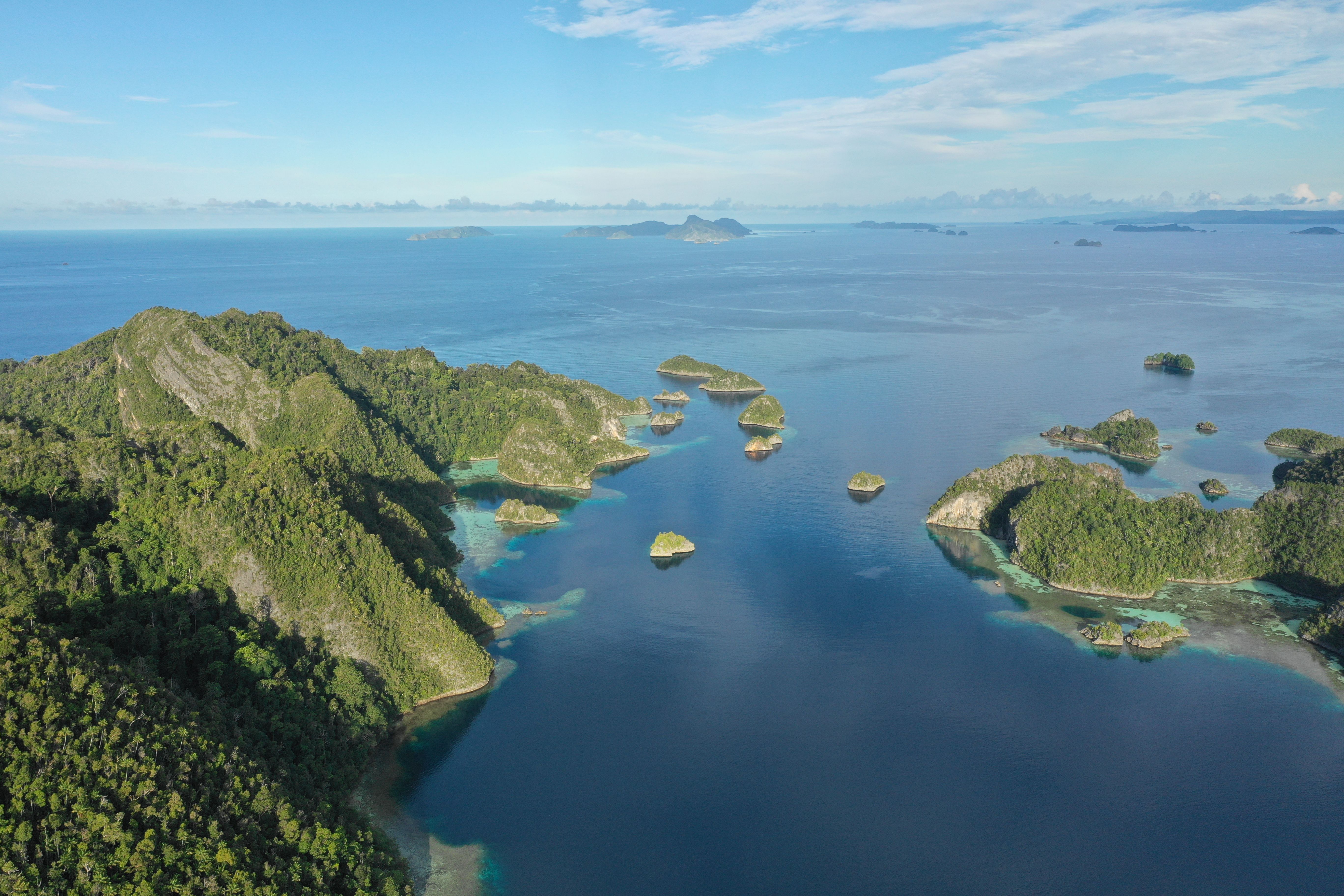 A serene Palau luxury coastal escape featuring emerald islets and turquoise waters